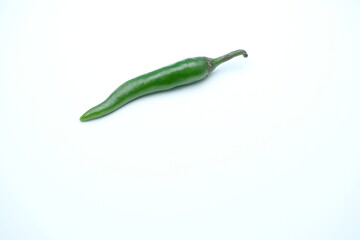 Single green Chili is isolated in white background ,cooling ingredient