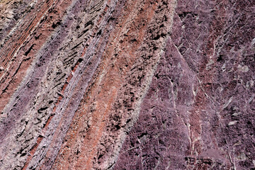 Colorful rock face with different layers - traveling and exploring the beautiful landscape around Torotoro national park in Bolivia, South America