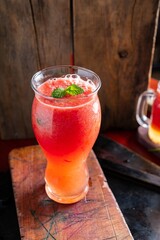 Refreshing Elixir: Close-Up of Fresh Tomato Juice in a Glass, Bursting with Vibrant Flavor and Color in 4K Resolution