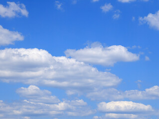 Beautyful blue sky with white clouds. Blue sky with clouds background. Calm bright day in summer.