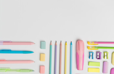 Flat lay with colorful school stationery on white backgroung, top view