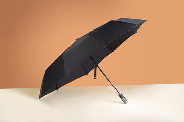 Mockup of a black large folding umbrella without logo