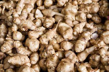 Close-up of fresh Jerusalem artichoke for sale at farmers market.