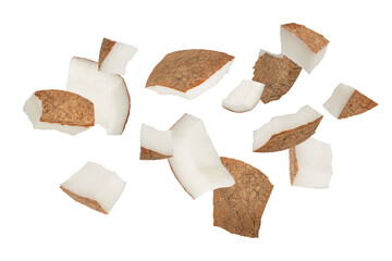 Slices of coconuts on a white isolated background. Coconut slices with a crust fly in different directions different sizes close-up. Coconut isolate. High quality photo