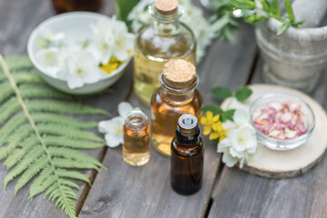 Natural beauty cosmetic skincare homemade products with pure essential oils, herbal extracts. Concept of organic ingredients in cosmetology, dermatology, body care treatment, massage