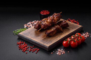 Delicious grilled chicken, turkey or pork skewers with salt, spices and herbs