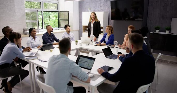 Company Inside Meeting In Office Boardroom