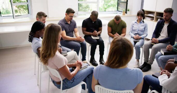 Christian Group Praying To Jesus