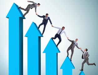 Colleagues helping each other to improve results