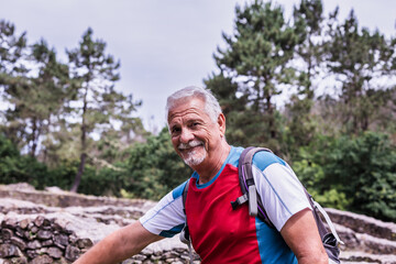Way of St James Pilgrim, Elderly active man happy smile in countryside Galician travel in nature