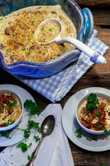 Crab and corn bisque or chowder in blue and white crockery.