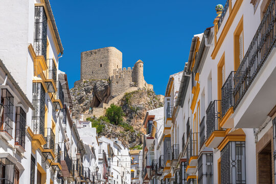 Fototapeta Street with Olvera Castle - Olvera, Andalusia, Spain