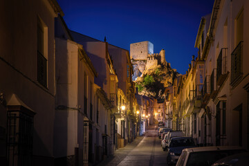 Street with Olvera Castle at night - Olvera, Andalusia, Spain