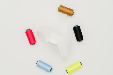 The clean and modern aesthetic of a minimalistic environment seamlessly complements the glossy ribbon image mockup