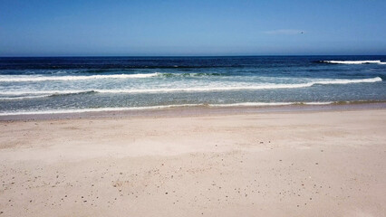 Ocean waves crashing on beach