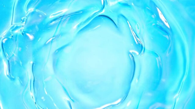 Super Slow Motion Shot of Waving Light Blue Liquid Surface at 1000fps.