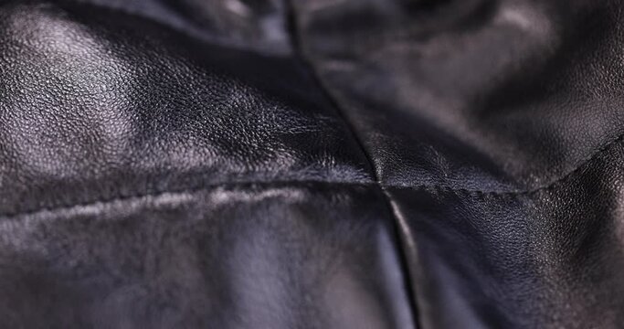 black - painted leather , details and part of the jacket made of artificial leather in black