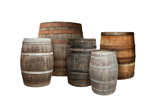 Many different wooden barrels on white background