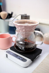 Brew coffee using the Kalita Sagan 101 flat bottom dripper