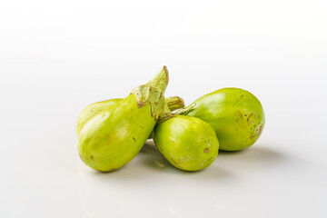 Fresh small eggplants on a pure white background