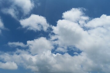 Fototapeta premium Natural background of blue sky with beautiful clouds