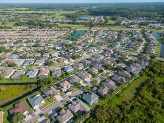Drone photography of neighborhood in Trinity Florida with suburban neighborhood and town landscape from above