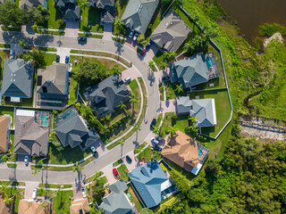 Drone photo of suburban area near New Port Richey Florida with houses and buildings in summer...
