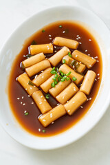 Spicy Jjajang Tteokbokki or Korean rice cake in spicy black bean sauce