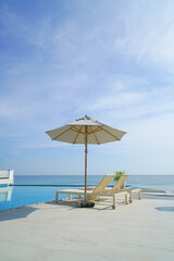 bed pool around swimming pool with sea background