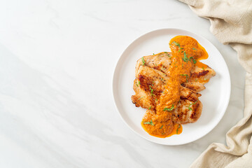 grilled chicken steak with red curry sauce