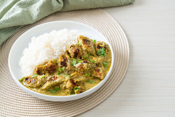 Afghani chicken in green curry or Hariyali tikka chicken hara masala with rice