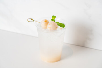 lychee with soda in glass