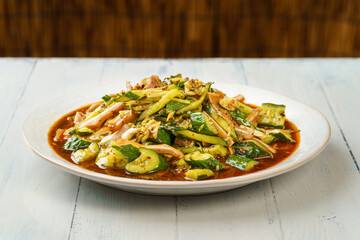 Chinese special cold dish with cucumber and pork ear
