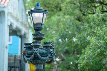 Selective focus on Elaborately Designed Historic Street Lamp on a Public Street in Uptown New...