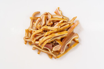 Fresh deli pig ears isolated on white background