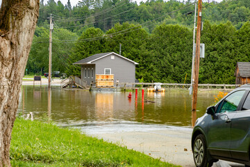 Coventry, Vermont, United States - July 12, 2023: A flooded road is seen in the Vermont town of...