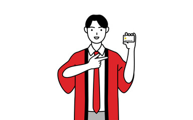 クレジット決済を勧める赤い法被を着た販売員の男性