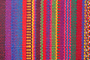 Vibrant Threads. Latin Tapestry. Colorful Woven Textile Background.