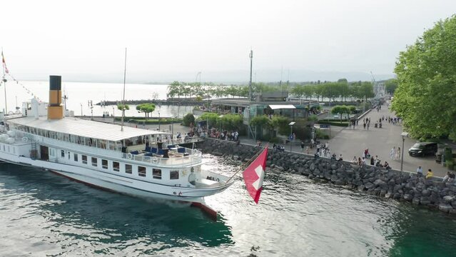 Jib down of beautiful cruise ship docked at harbor in Lausanne, Switzerland