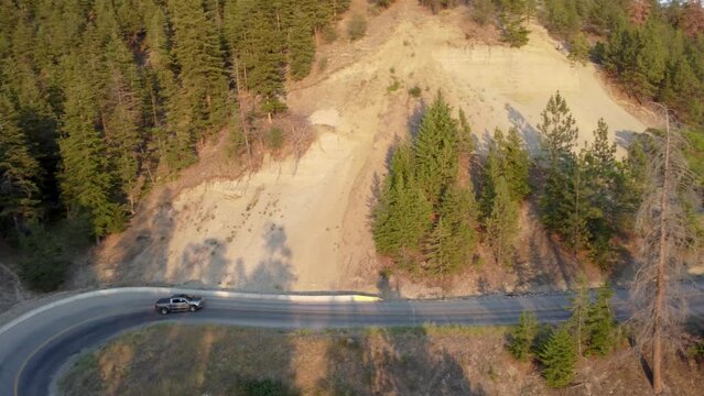 Ford Pickup on Windy Road Overlooking Okanagan Lake | Lakecountry, British Columbia, Canada | Okanagan Landscape | Scenic View | Wine Vineyard | Lakeside Shoreline | Summer Time | South Facing Kelowna