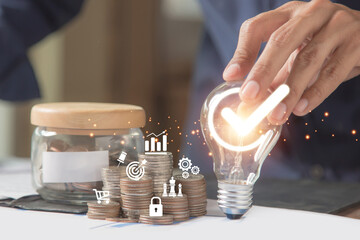 Close up hand choose light bulb or lamp for human resources or leadership and creativity thinking idea motivation or vision and knowledge learning and study or education concept.