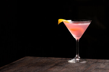 Classic Cosmopolitan Cocktail alcoholic gin, triple sec liqueur, fresh lemon juice and raspberry sugar syrup