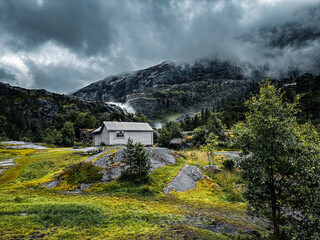 Small alpine church in Norway | dramatic mountain landscape
