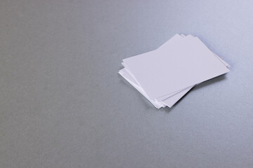 White business cards with copy space on grey background