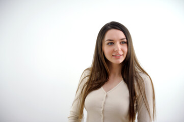 Young caucasian woman isolated on white background laughs out loudly keeping hand on chest. High...