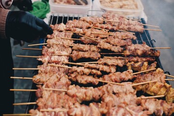 Thailand traditional food, Thailand street food, pork are grill with sweet sauce.