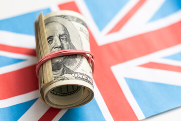 Great Britain national flag and the dollar bills. Business and finance concept, soft focus