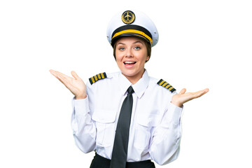 Airplane pilot woman over isolated chroma key background with shocked facial expression