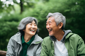 happy retired couple in the park