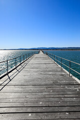 Obraz premium Scenic view of blue sky over Port Germein jetty and ocean